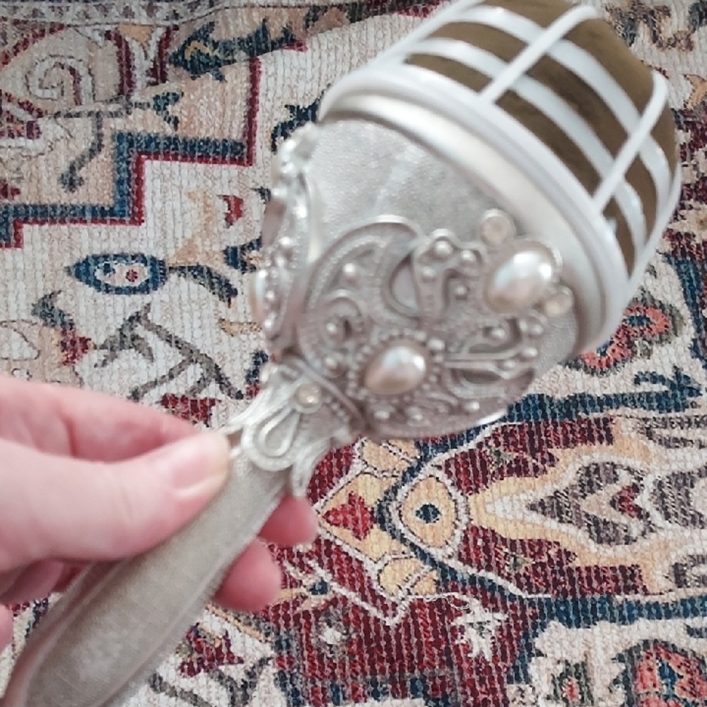 Elegant Silver and Gold Handheld Mirror